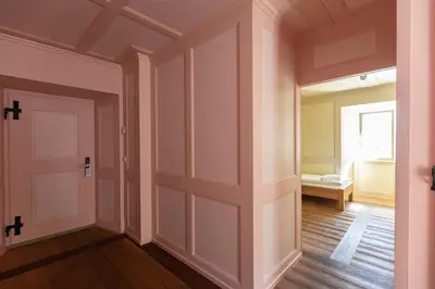 Ein Bett oder Betten in einem Zimmer der Unterkunft Hotel Restaurant Stockalperturm