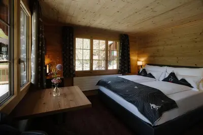Ein Bett oder Betten in einem Zimmer der Unterkunft Bodehüttli