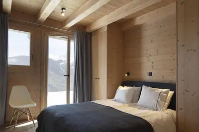 Ein Bett oder Betten in einem Zimmer der Unterkunft Bishorn COSY chalet 4 personnes