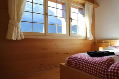 Ein Bett oder Betten in einem Zimmer der Unterkunft Excellent flat with a fantastic view of the Eiger!