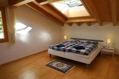 Ein Bett oder Betten in einem Zimmer der Unterkunft Excellent flat with a fantastic view of the Eiger!