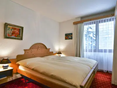 Ein Bett oder Betten in einem Zimmer der Unterkunft Apartment Chalet Abendrot apARTments-32 by Interhome