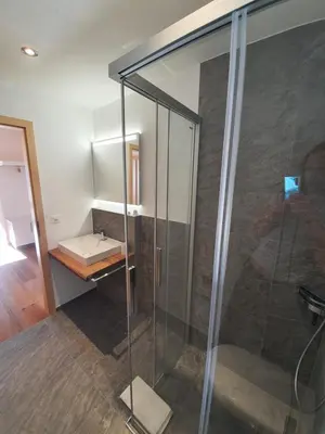 Ein Badezimmer in der Unterkunft Alpen-Park Dachwohnung Ost