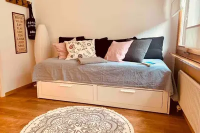 Ein Bett oder Betten in einem Zimmer der Unterkunft Studio im modernen Alpenstyle