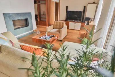 Ein Sitzbereich in der Unterkunft Seehaus Lake View 3-Bedroom Apartment