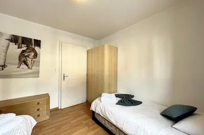 Ein Bett oder Betten in einem Zimmer der Unterkunft Richemont - A charming stay in the heart of the Alps