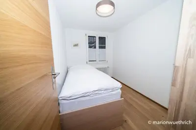 Ein Bett oder Betten in einem Zimmer der Unterkunft Mountain Apartments Zermatt Nr 1