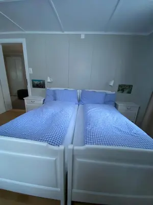Ein Bett oder Betten in einem Zimmer der Unterkunft Familienferien im Chalet Bärgli Kandersteg