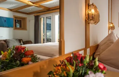 Ein Bett oder Betten in einem Zimmer der Unterkunft Hotel Silberhorn