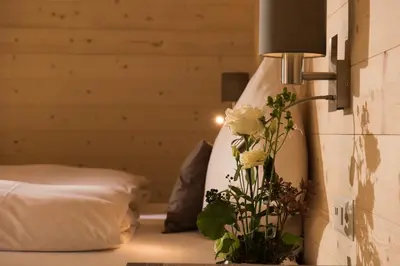 Ein Bett oder Betten in einem Zimmer der Unterkunft Hotel Silberhorn