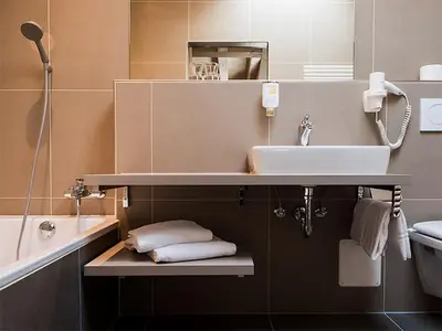 Ein Badezimmer in der Unterkunft Hotel Silberhorn