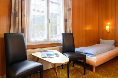 Ein Bett oder Betten in einem Zimmer der Unterkunft Hotel Bel-Air Eden