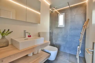 Ein Badezimmer in der Unterkunft Mitenand Attika
