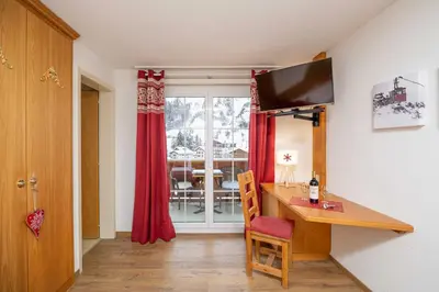 TV/Unterhaltungsangebot in der Unterkunft Grichting Hotel & Serviced Apartments