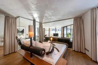 Ein Bett oder Betten in einem Zimmer der Unterkunft Matterhorn FOCUS Design Hotel