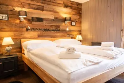 Ein Bett oder Betten in einem Zimmer der Unterkunft Chalet La Neuf