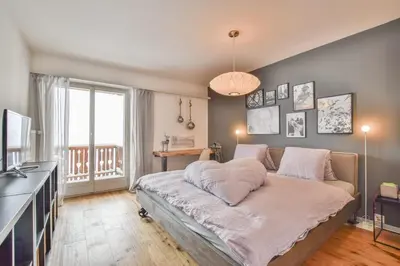 Ein Bett oder Betten in einem Zimmer der Unterkunft Valaisia 124