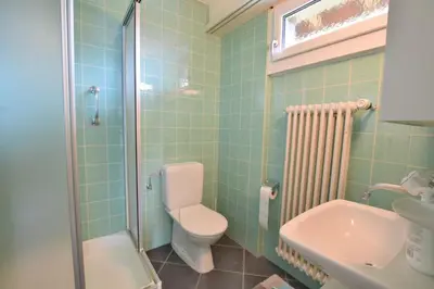 Ein Badezimmer in der Unterkunft Waldesrand Matterhorn