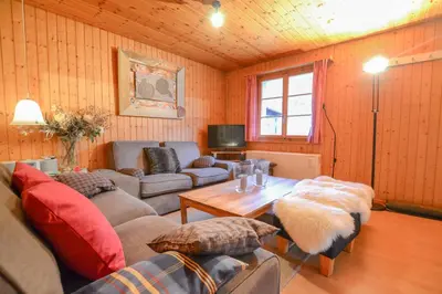 Ein Sitzbereich in der Unterkunft Chalet Castellani Apartment