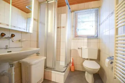 Ein Badezimmer in der Unterkunft Chalet Castellani Apartment