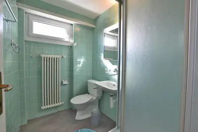 Ein Badezimmer in der Unterkunft Waldesrand Bättlihorn