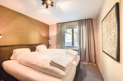 Ein Bett oder Betten in einem Zimmer der Unterkunft Hollandia 18