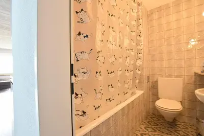 Ein Badezimmer in der Unterkunft Rhodania 66