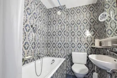 Ein Badezimmer in der Unterkunft Rhodania 60