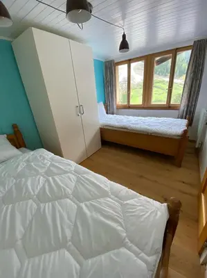 Ein Bett oder Betten in einem Zimmer der Unterkunft Sunnu-Loft
