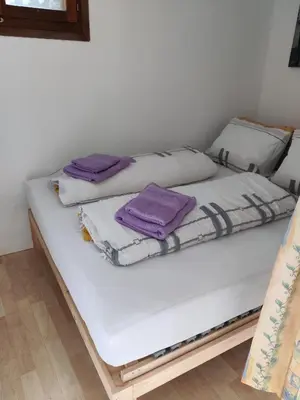 Ein Bett oder Betten in einem Zimmer der Unterkunft Studio FranGiò