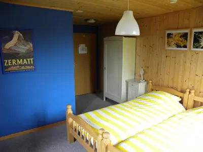 Ein Bett oder Betten in einem Zimmer der Unterkunft Hotel Restaurant Walliser Sonne