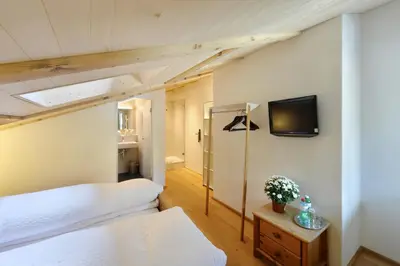 Ein Bett oder Betten in einem Zimmer der Unterkunft Hotel-Restaurant zum Gade