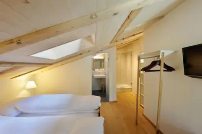 Ein Bett oder Betten in einem Zimmer der Unterkunft Hotel-Restaurant zum Gade