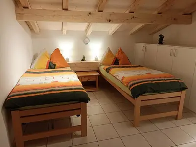 Ein Bett oder Betten in einem Zimmer der Unterkunft Apartment Lischa 3- OG Süd by Interhome