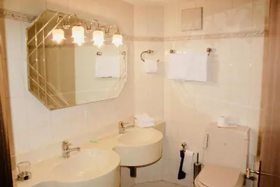 Ein Badezimmer in der Unterkunft Hotel du Pont