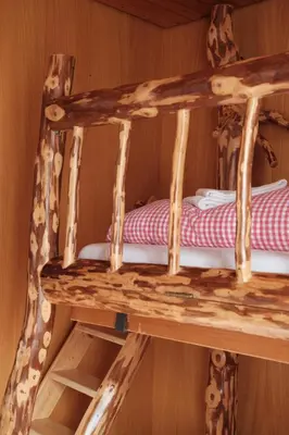 Ein Bett oder Betten in einem Zimmer der Unterkunft Hotel Tourist