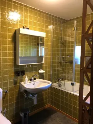 Ein Badezimmer in der Unterkunft Appartement Waidmannsheil mit schöner Aussicht