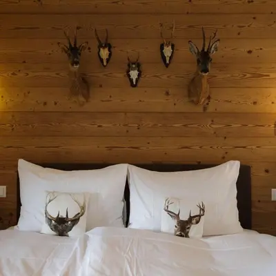 Ein Bett oder Betten in einem Zimmer der Unterkunft Bergwelt Grindelwald Residence