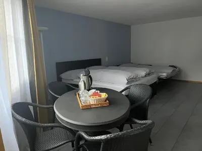 Ein Bett oder Betten in einem Zimmer der Unterkunft Hotel Viktoria Eden
