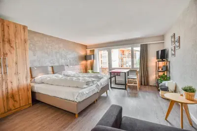 Ein Bett oder Betten in einem Zimmer der Unterkunft Rhodania 52