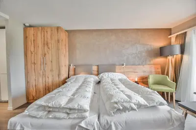 Ein Bett oder Betten in einem Zimmer der Unterkunft Rhodania 52
