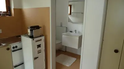 Ein Badezimmer in der Unterkunft Holzji