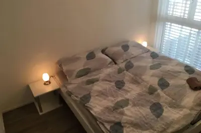 Ein Bett oder Betten in einem Zimmer der Unterkunft Modern Apartment 모던 펜션
