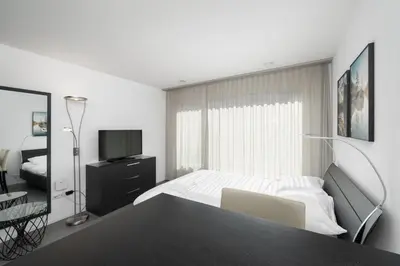 Ein Bett oder Betten in einem Zimmer der Unterkunft Studio ANDY Interlaken