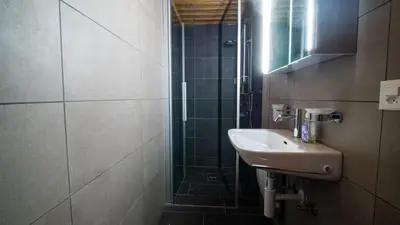 Ein Badezimmer in der Unterkunft Izba