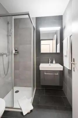 Ein Badezimmer in der Unterkunft Studio VICTORIA Interlaken