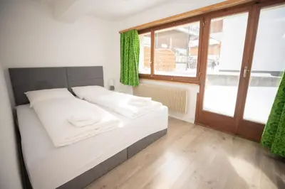 Ein Bett oder Betten in einem Zimmer der Unterkunft Haus Slalom
