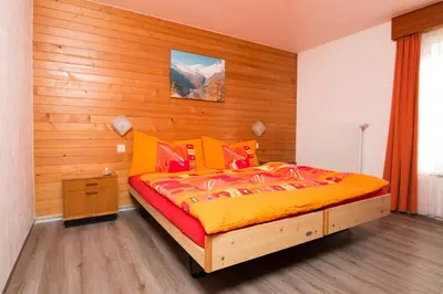 Ein Bett oder Betten in einem Zimmer der Unterkunft Am Biel Saas-Fee