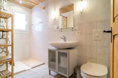 Ein Badezimmer in der Unterkunft Apartment Rybibach Retreat - GRIWA RENT AG