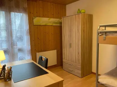 Ein Bett oder Betten in einem Zimmer der Unterkunft Ferienwohnung Chirchgass